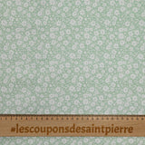 Piqué de coton imprimé fleurs printanière fond vert