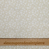 Piqué de coton imprimé fleurs printanière fond beige