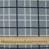 Coton imprimé à carreaux marine fond gris