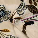 Short velvet jersey with black and brown flower print, ivory background