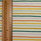 Algodón estampado de rayas multicolor con fondo crudo