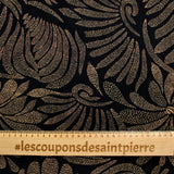 Popeline de coton imprimée pétales en pointillisme marron fond noir
