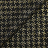 Tweed de mezcla de lana de pata de gallo dorado sobre fondo negro