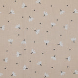 Pique of cotton printed dandelion beige background