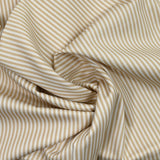 Piqué de coton imprimé rayé beige fond blanc