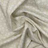 Piqué de coton imprimé fleurs printanière fond beige