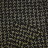 Tweed de mezcla de lana de pata de gallo dorado sobre fondo negro