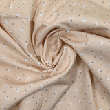 Pique of cotton printed dandelion beige background