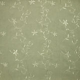 Voile de polyester brodé fleurs et feuillages vert sauge
