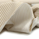 Piqué de coton imprimé rayé beige fond blanc