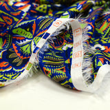Twill de polyester satin imprimé virtuose orange et vert fluo