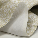 Piqué de coton imprimé fleurs printanière fond beige