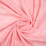 Broderie anglaise festonnée rose dragée