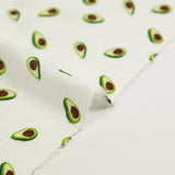 Double printed gauze green avocado white background