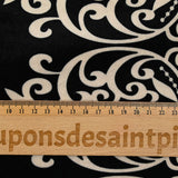 Jersey corto de terciopelo con raya ornamental y estampado de lunares marfil, fondo negro