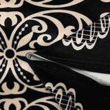 Jersey corto de terciopelo con raya ornamental y estampado de lunares marfil, fondo negro
