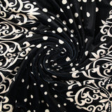Jersey corto de terciopelo con raya ornamental y estampado de lunares marfil, fondo negro