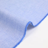 Washed blue dyed woven cotton