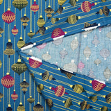 Cotton poplin printed with vintage Christmas baubles on a duck background