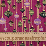 Cotton poplin printed with vintage Christmas baubles on a purple background