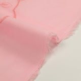 Broderie anglaise festonnée rose dragée