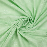 Broderie anglaise festonnée vert d'eau