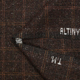 Speckled wool blend with brown background checks