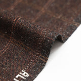 Speckled wool blend with brown background checks