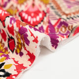 Viscose matelassée double face ikat et cachemire rose et violet au mètre