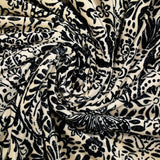 Short velvet jersey with cashmere print and black flower on ivory background