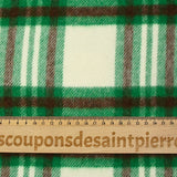 Brushed polyester wool with green and brown checks on an ecru background