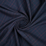 Tissu tailleur laine mélangée à carreaux brique fond bleu marine
