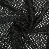 Cordón de poliéster de chevron negro con fondo negro.