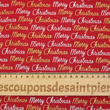 Cotton poplin printed with Merry Christmas in gold and silver on a red background