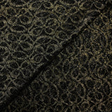 Dentelle polyester fleurs dorées brodées lurex noir
