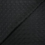 Maille dentelle fleurs stylisées fond noir