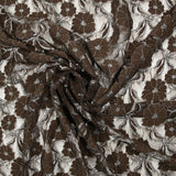 Dentelle polyester Martha métallisé argent fond marron