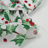 Polycotton printed Christmas hoe green and red ball