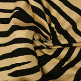 Gabardine de coton imprimée zèbre fond sable