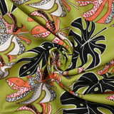 Lin viscose imprimé pluie de monsteras fond vert