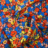 Crespón de viscosa a rayas lúrex plateado Camelia fondo azul marino y rojo