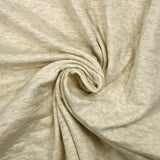Jersey de coton matelassé écru chiné