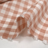 Dyed woven polycotton linen look gingham pink beige and white