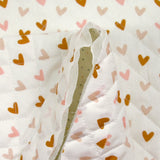 Double-sided quilted cotton polka dots and hearts white background per meter