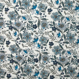 Double-sided quilted cotton Mayla blue flowers white background per meter