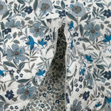 Double-sided quilted cotton Mayla blue flowers white background per meter
