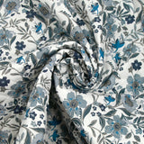 Double-sided quilted cotton Mayla blue flowers white background per meter