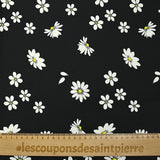 Cotton gabardine with daisy print on black background