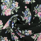 Viscose crepe printed navy flowers and old pink black background