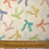 Cotton printed ribbon bows with ecru background